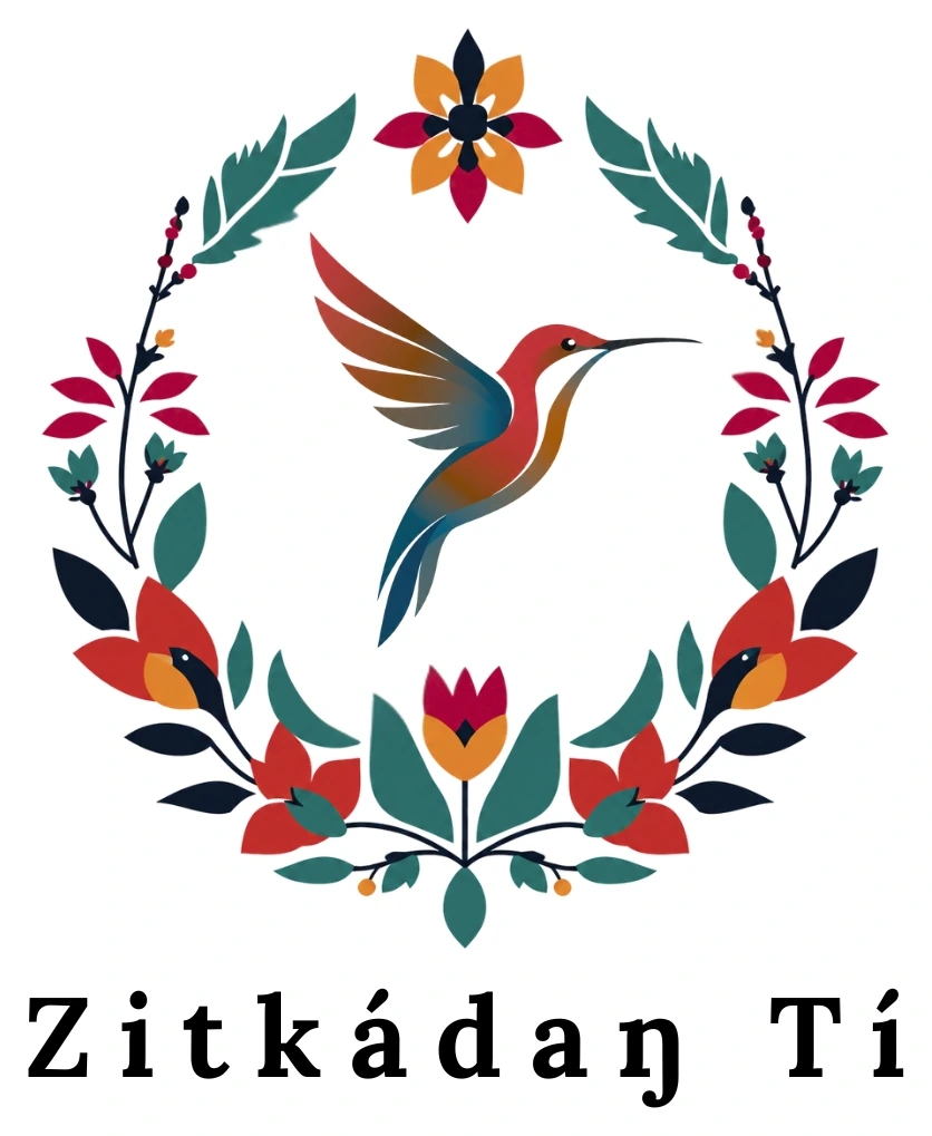 Zitkádan Tí logo featuring a hummingbird surrounded by flowers and leaves